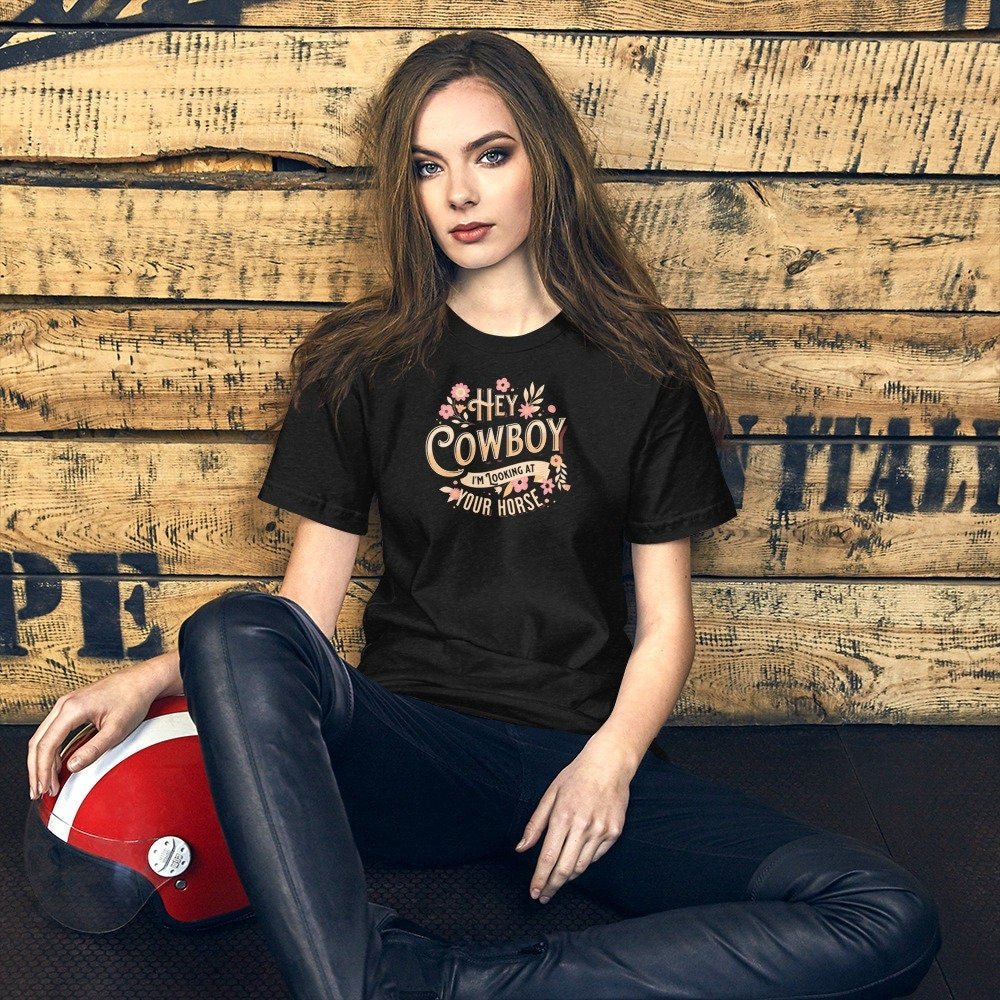 DukeKaysa's tweet photo. Excited to share the latest addition to my #etsy shop: Hey Cowboy, I&amp;#39;m Looking At Your Horse Unisex t-shirt #westerncowboy #shortsleeve #crew #gift #birthday #cowboy #western #flowers #horse https://t.co/Os7TQ2R62C https://t.co/PGajGsFN8y