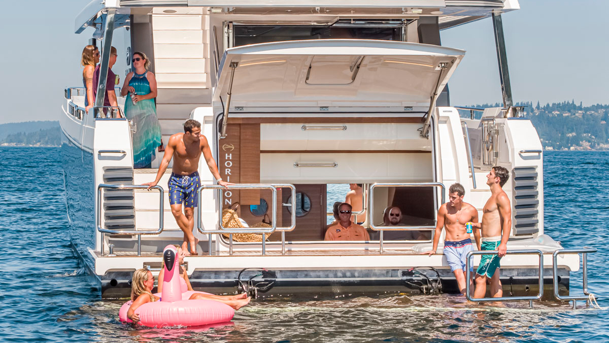 HorizonYachtUSA's tweet photo. Those lazy days of summer are almost here! The Horizon #V68 features an incredibly spacious design that accommodates all your friends and family with every amenity the waterborne will desire. #DefineYourHorizon https://t.co/nOVkPA3NBa