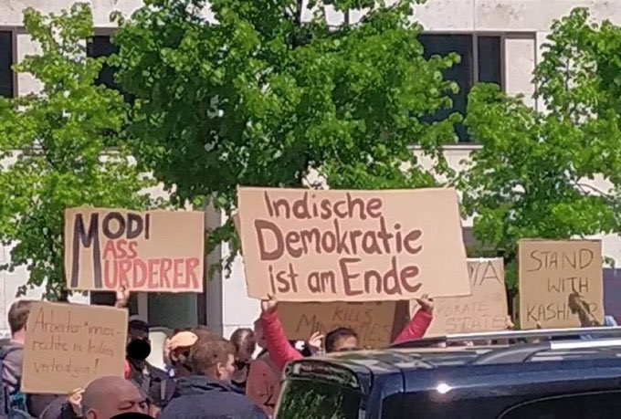 sahil19851985's tweet photo. Indian media won’t show you this #ModiInBerlin #murderer https://t.co/wpII6ZvDUG