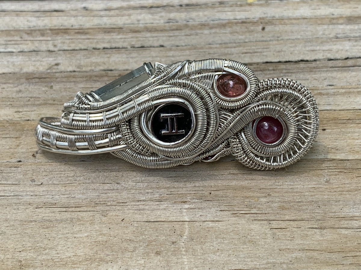 HBARWraps's tweet photo. Check out Barakaβs @ReggieWraps pendant featured in the first of the NFTs being released. #Baraka #sterlingsilver #ruby #tourmaline #aquamarine #Garnet #handmadewithlove #phygital #BHdesigns #hbarwrap #collaboration #rare #le #9 https://t.co/BjNcbIpFcf