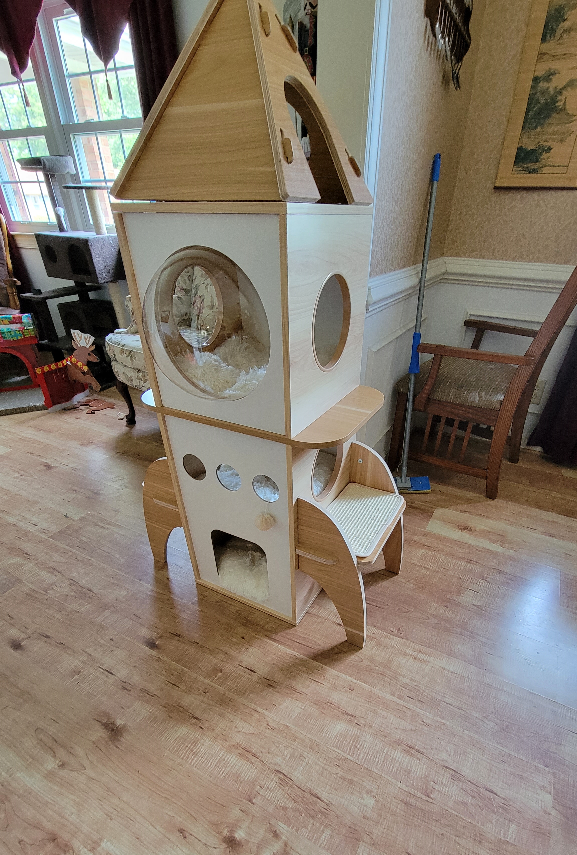biliouris_amber's tweet photo. The Kitty Rocket Cat tower.  I assembled this with the help of our caregiver.  #CatsOnTwitter  #CatTower  #RocketTower https://t.co/IKtuY1ustl
