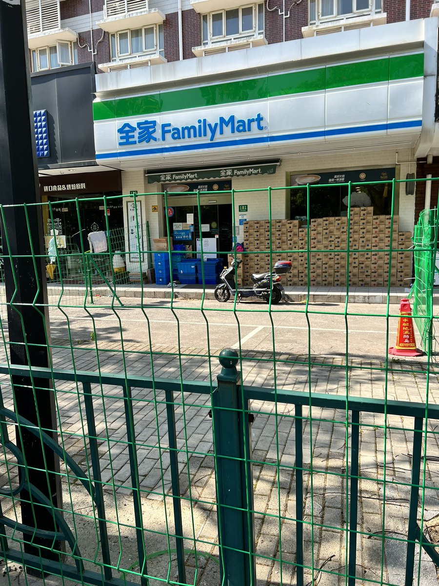 Yesterday I was let out of my apartment complex for the first time in 48 days. Used a rental bike to go around Zhangjiang. Almost all shops and businesses were fenced off but found one convenience store selling juice and potato chips from behind the fence. The boxes are all chips