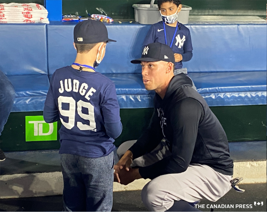 GregoryStrongCP's tweet photo. “I asked him who his favourite player was and he turned around and showed me his little jersey. That still gives me goosebumps to this day.” Aaron Judge meets youngster Derek Rodriguez, a day after a clip of the boy being given HR ball goes viral - Story: https://t.co/suwu1eXL9i https://t.co/OwzH09F0vn