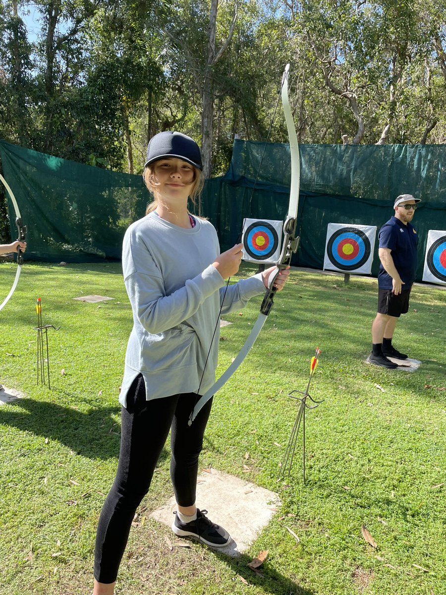 Year62022's tweet photo. Group D trying their hand at archery. https://t.co/QOvwRfcont