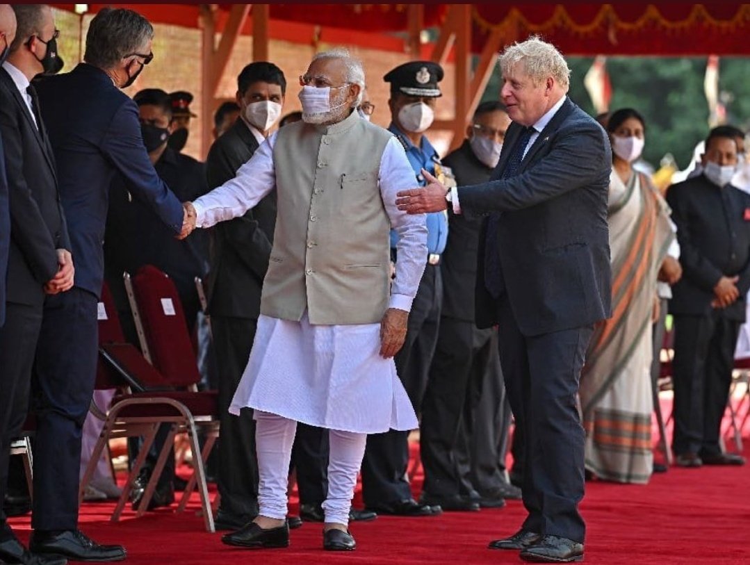 Parody_PM's tweet photo. India has many cultural differences which can seem strange to us. For example, everyone else wore a face mask. Must be a religious thing. https://t.co/gPDux64Wbh