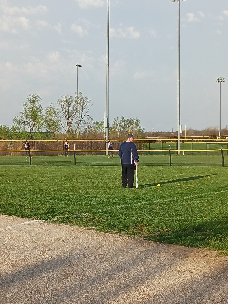 MpactSoftball's tweet photo. Warming up for our first game.  Who ordered this wind https://t.co/4puWxjcWes