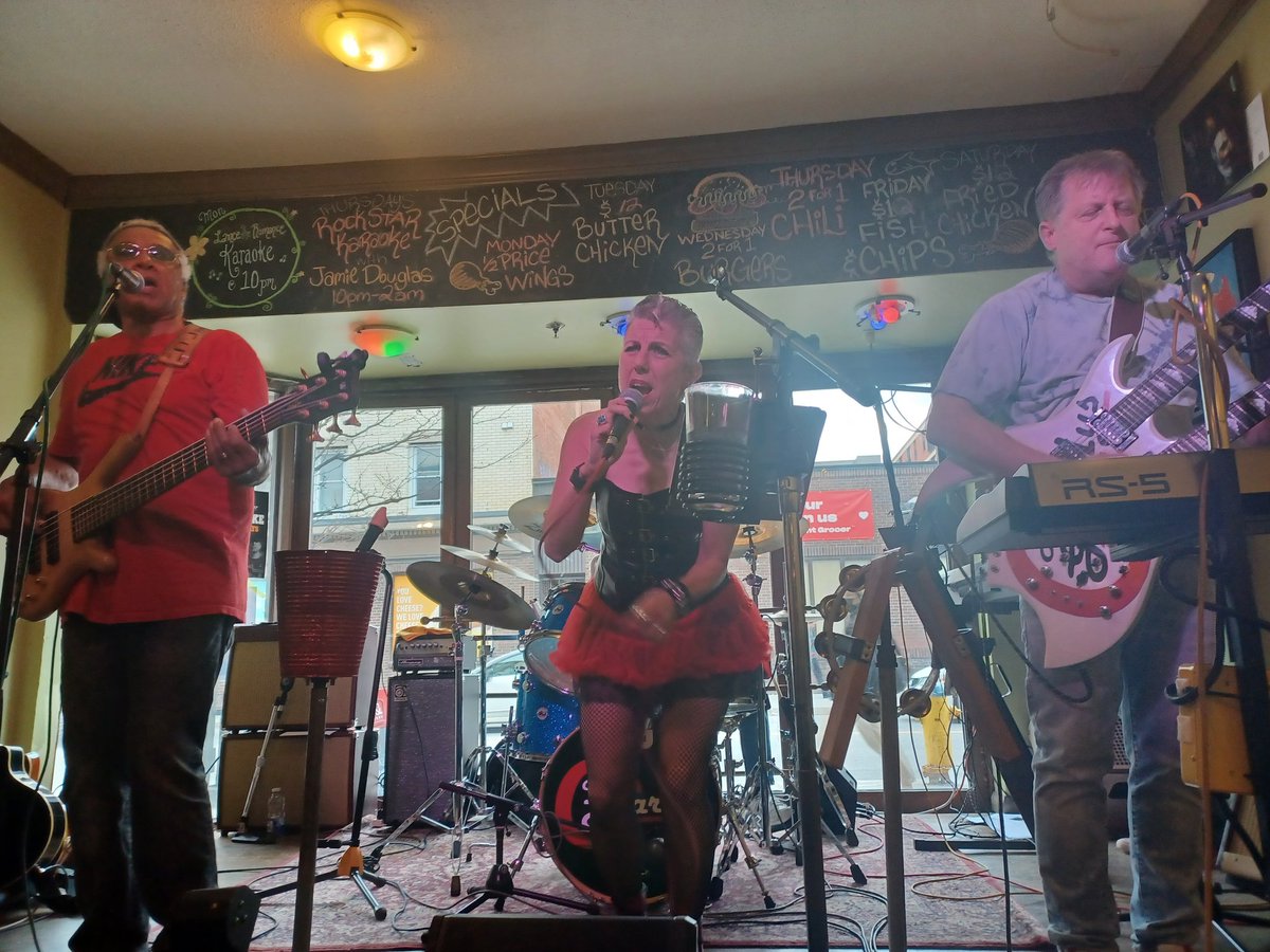 FundamentalBass's tweet photo. Ottawa band #Gnarleys rocking it out at Atomic Rooster to a full house. Lead singer Cynthia wowed the audience with her enthusiastic vocals and leather corset/red tutu outfit. https://t.co/E49Cuw6hMK