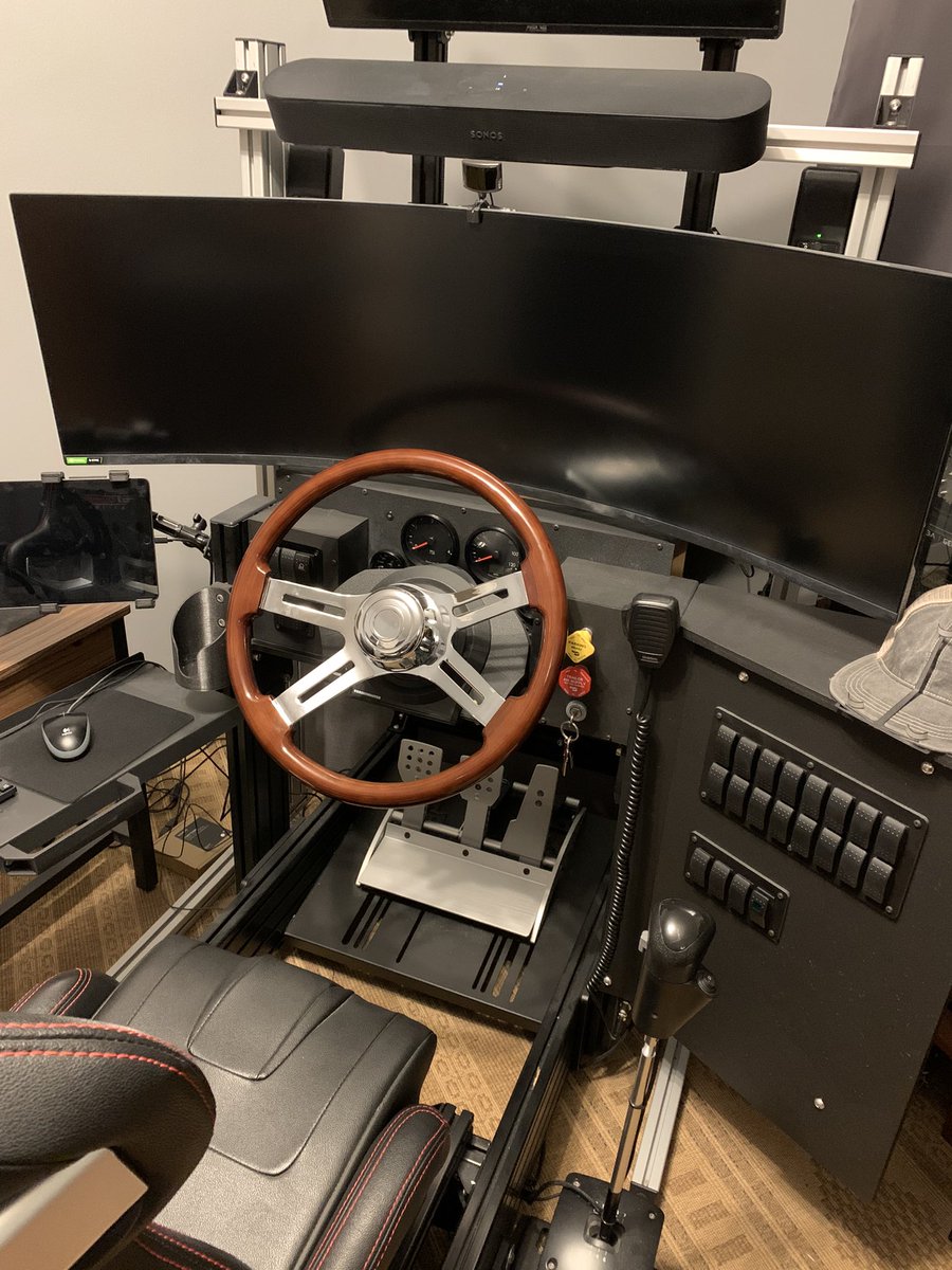 Teknogroovin's tweet image. Sim Rig is almost finished,needs a little cable clean up. It has working gauges and turn signals. All those switch control something on the trucks. 18” wheel from local Peterbilt dealer. Built to play @SCSsoftware ATS and ETS games. Driving for @meeeLadyBear ‘s trucking company.