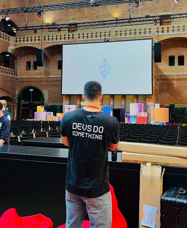 aave's tweet photo. The devs are doing something…. #ETHAmsterdam https://t.co/rzhb2wE4zj