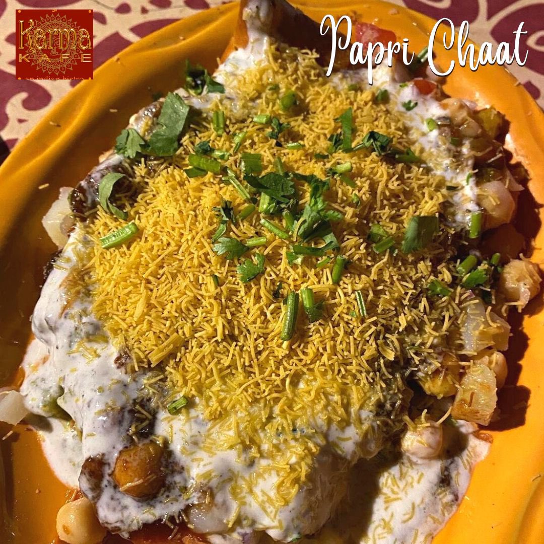 Up close &amp; personal with our coolest appetizer! 
 Papdi crackers topped with chilled chick peas, diced potatoes, onions, yogurt and chutneys! You gotta try this one! 😋

For Reservations call: 201.610.0900

#KarmaKafe #HobokenEats #hobokennj #PapdiChaat #IndianFood