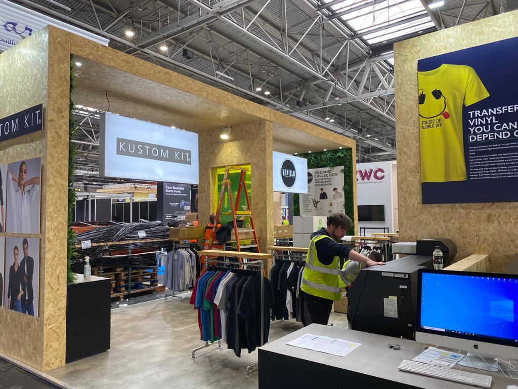 kustom_kit's tweet photo. We're hard at work setting up on stand C70 ready for @PandPLive
 tomorrow! Who's coming to see us? #pandplive2022 #xpres #epson #DTG #print #printing #printers #sublimation #sublimationprinting #HTV https://t.co/F2duZelwZJ