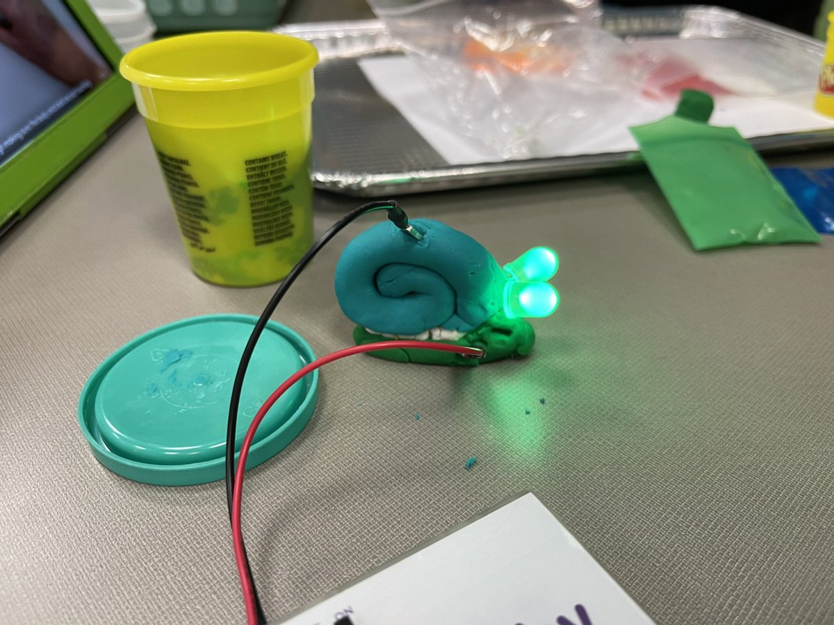 BookSmith123's tweet photo. Smith Readers making squishy circuits in Library! Lighting up the place! 💡 @TenaflySchools @J_SpencerSmith #squishycircuits https://t.co/JEz2AQUm4f