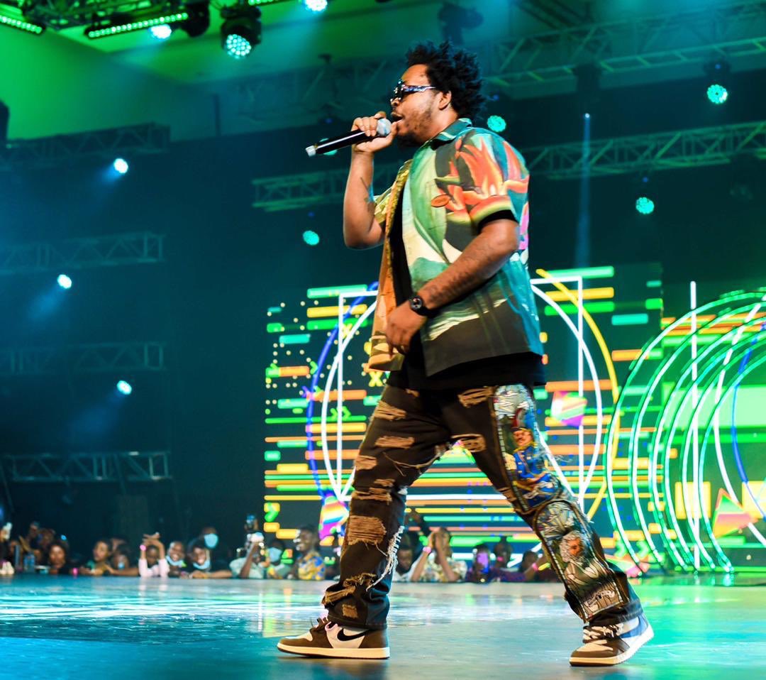 GloWorld's tweet photo. @olamide doing what Badoo knows how to do best, setting the stage on fire !!! 🔥

It can only be one of the biggest dance shows in Nigeria, Glo Battle of the Year💚

Follow the live action on the @myglotv app now.

#GloBattleOfTheYear https://t.co/N4j8bCAkz7