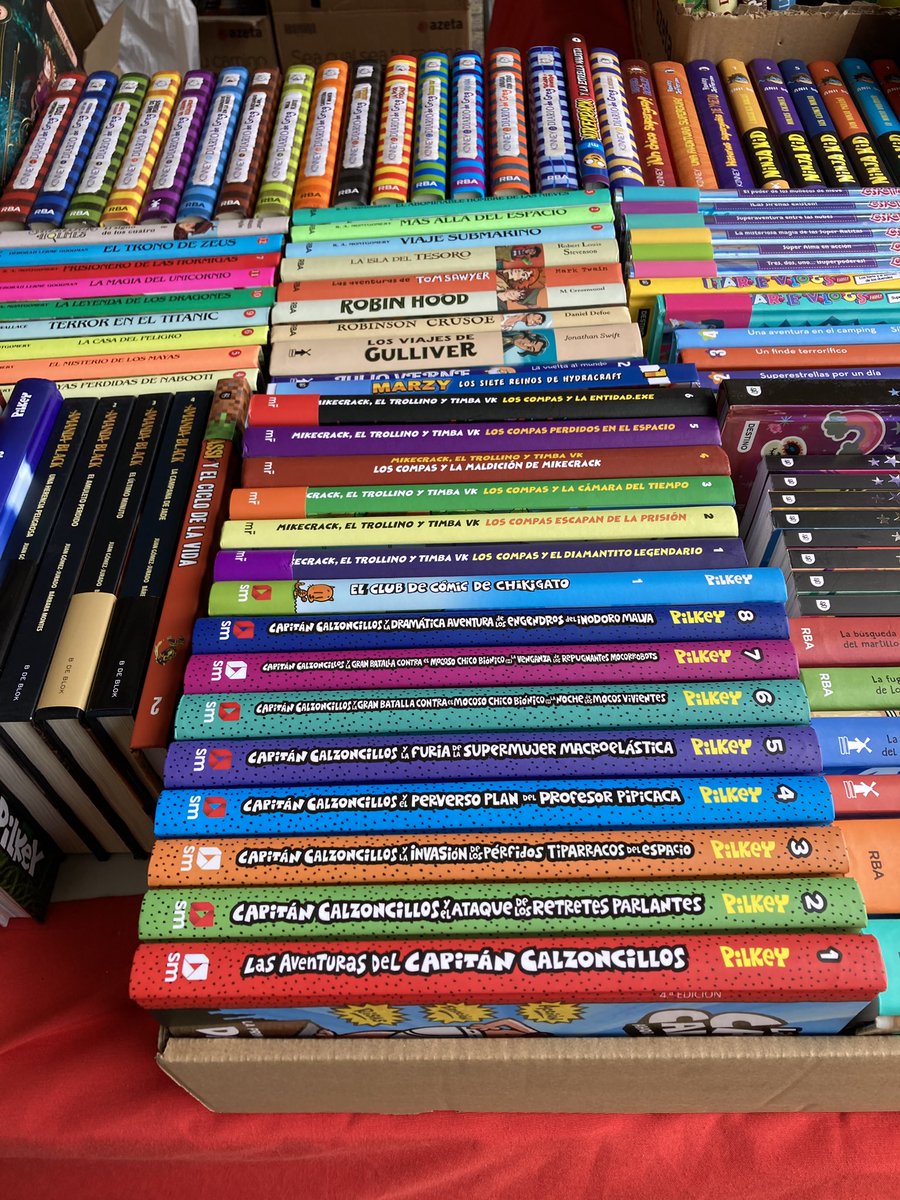 BethCerullo's tweet photo. All the classics for sale on #BookDay2022 in #Salamanca Spain. Love how they’ve got Robin Hood and Robinson Crusoe sandwiched between Dav Pilkey and @wimpykid!  And I was so happy to see @JamesPonti - one of my students’ favorites back home @DenverEl! https://t.co/4Vi2V8YvMD