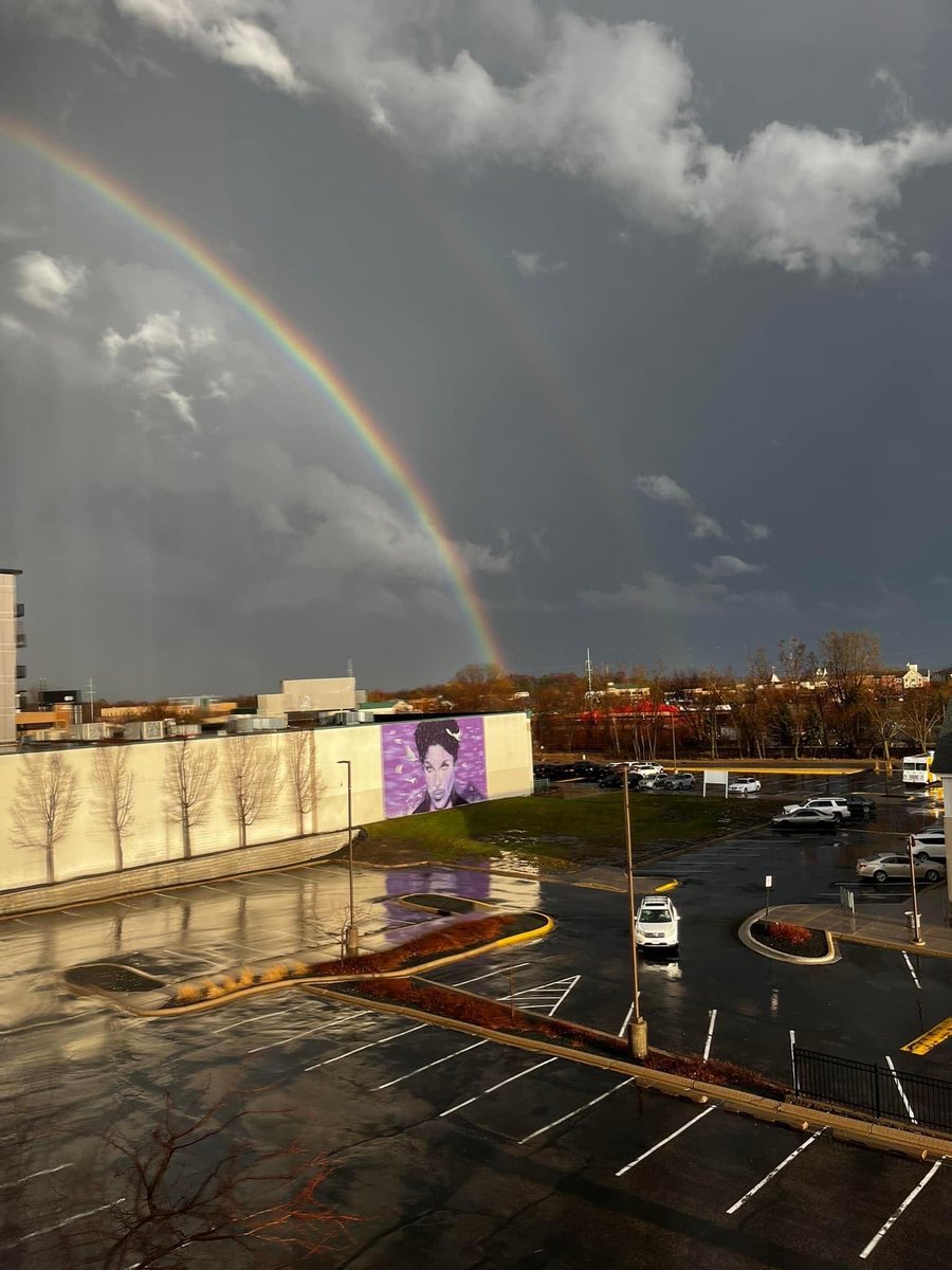 BDeemua's tweet photo. 4/23/2022, double rainbow over the Prince mural and behind Paisley Park in Chanhassen. It was a beautiful and divine sight after such heavy rain, thunder and lightning. Thank you🙏🏾❤️💜💜 https://t.co/U5NKr1TOMe