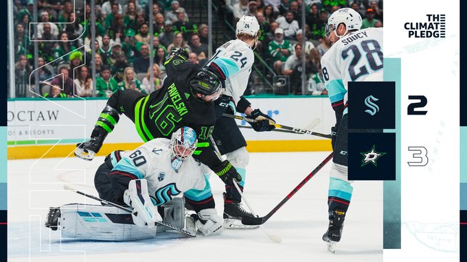 final score graphic image of joe pavelski tumbling over chris driedger in front of the net stars win, 3-2. Climate pledge logo in top right