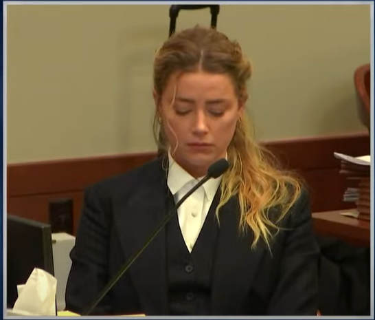 LittleThings226's tweet photo. Amber Heard pretending       Amber Heard immediately
to have PTSD listening to      snapping out of it on the
Johnny slam cupboards         next question https://t.co/tQXnCVxBBu