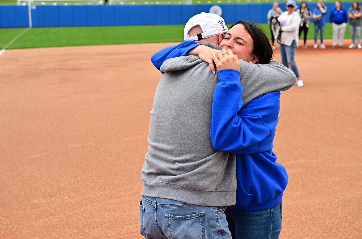 Michael Jonas, father of the late Gabbie Jonas, handed the ball to her former teammate Taryn Peña to throw the first pitch prior to today’s double header. 

We 💙 you 15, always.