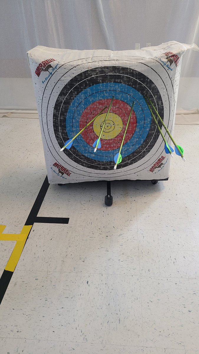 MsRosanne_reads's tweet photo. Who says staff meetings can't be exciting? Not THIS #encoreteam. Time for some Archery courtesy of @CoachPybus and @libmediabeach! @MrsSarmientoart did a great job and I had a few good attempts. Not bad since the last time I practiced was grade school. #BAESencore #teambuilding https://t.co/3JnCwEATnX