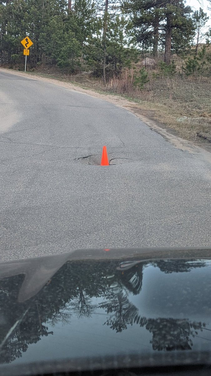 Lolomaz's tweet photo. Omg @KarenKilgariff I found my first sinkhole on my very own street! It's just a lil guy but I GET IT now https://t.co/3tCFmC20XA