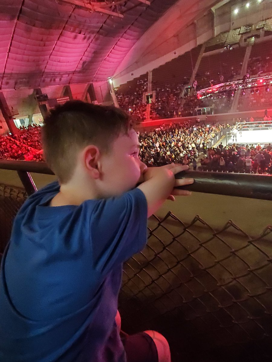 Trishagreenbean's tweet photo. My kid is crying at his first live wrestling event because of the outcome of that Miz match. I am crying because my kid is a @mikethemiz fan. #WWEMontgomery https://t.co/WHtHeRolrZ