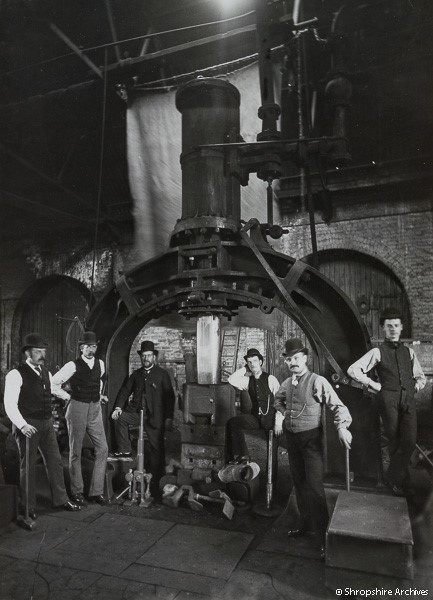 Really really love this photo. If it was a cinema poster - would definitely go and see this film. Steam Hammer, Railway Carriage and  Wagon  Works, Coleham, Shrewsbury, 1888 [PH/S/13/C/22/23] #OldPhotos #Coleham #CarriageWorks #GreatHats #StrongPose