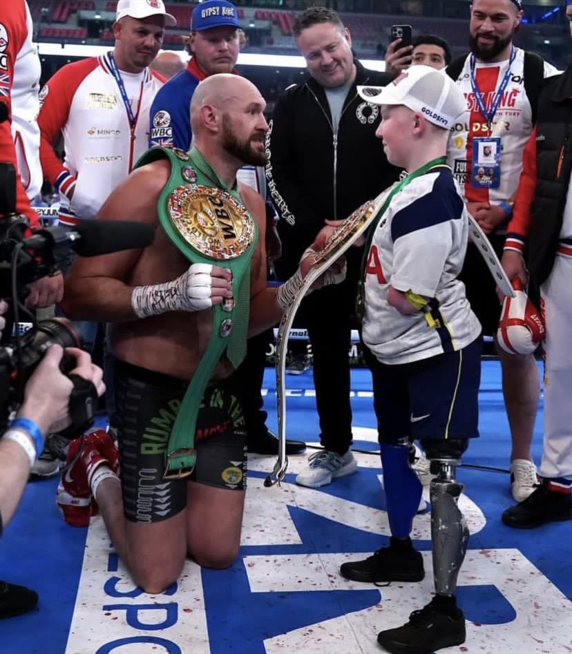 JamesMelville's tweet photo. After successfully defending his World Heavyweight boxing title, Tyson Fury takes time out to chat to Marshall Janson from Perranporth, Cornwall - who had his legs and hands amputated as a baby after contacting Meningitis. 🥊 ♥️ https://t.co/ky9idj5F3f