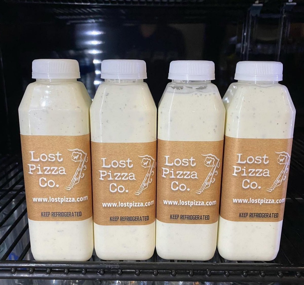 GetLostPizza's tweet photo. Are you a fan of our housemade ranch? Take some home with you by the bottle! https://t.co/aUKAvSyHDn