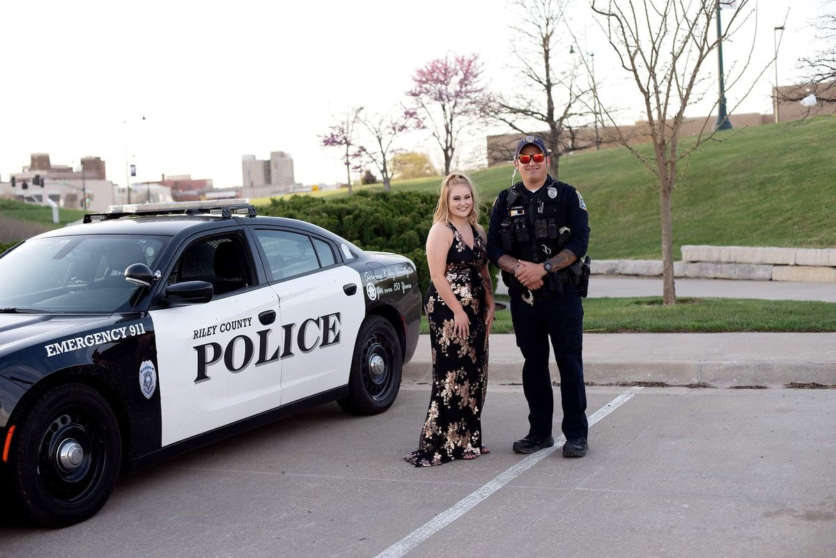 RileyCountyPD's tweet photo. Police Prom Pic

This young lady's father is an officer in another jurisdiction and couldn't make her photo op.

Officer Zapata happened to drive by and she asked if he would take a picture with him.

A memory that will last a lifetime. https://t.co/68PTKTO5zB