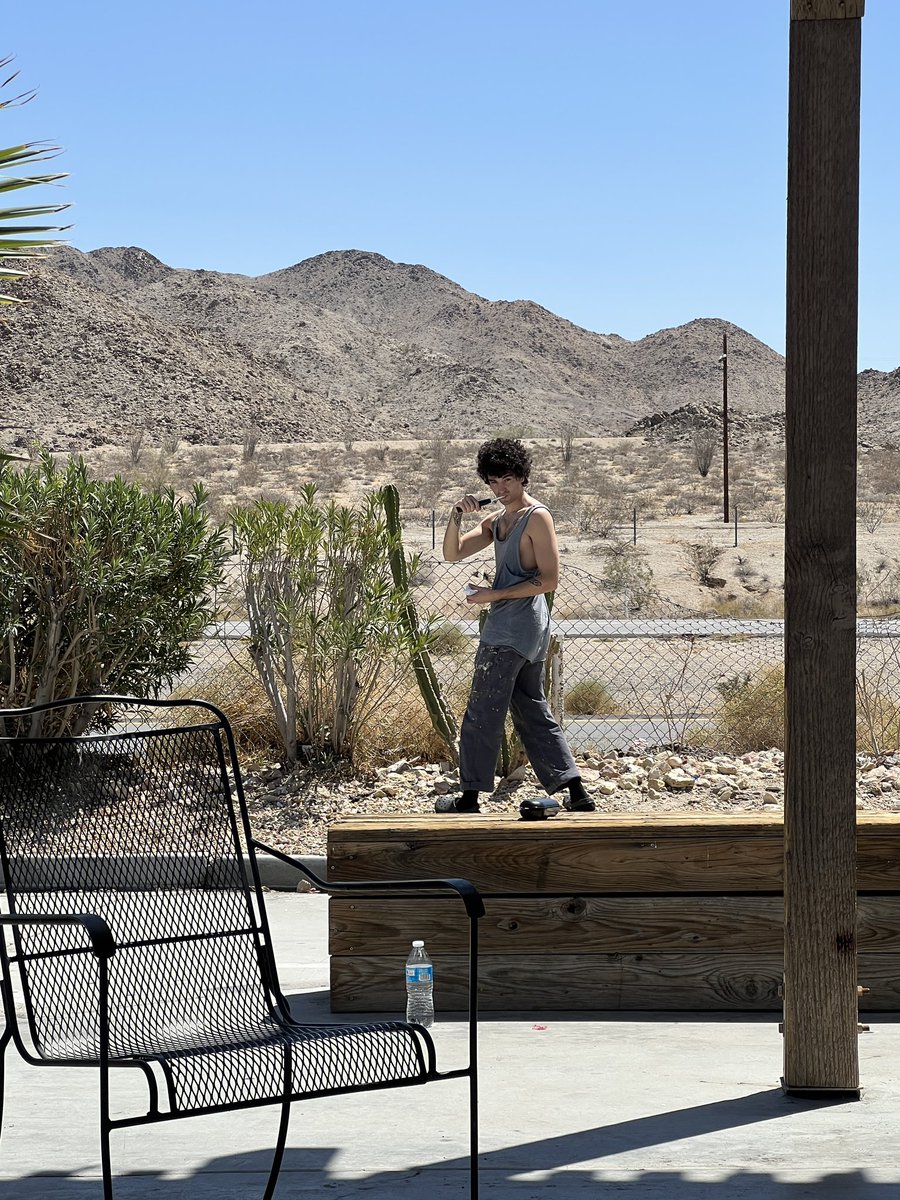 AdamMelchor's tweet photo. brushing my teeth in the desert https://t.co/bLhZa835qI