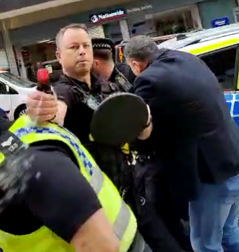 SYMAAG's tweet photo. We are shocked at the police violence today during a peaceful protest in Sheffield in response to recent invasions by Erodagn's government in Kurdistan. Kurdish flags were ripped from protestors' hands, who were then beaten and pepper sprayed when they tried to retrieve them. https://t.co/ss4HDD0jK4