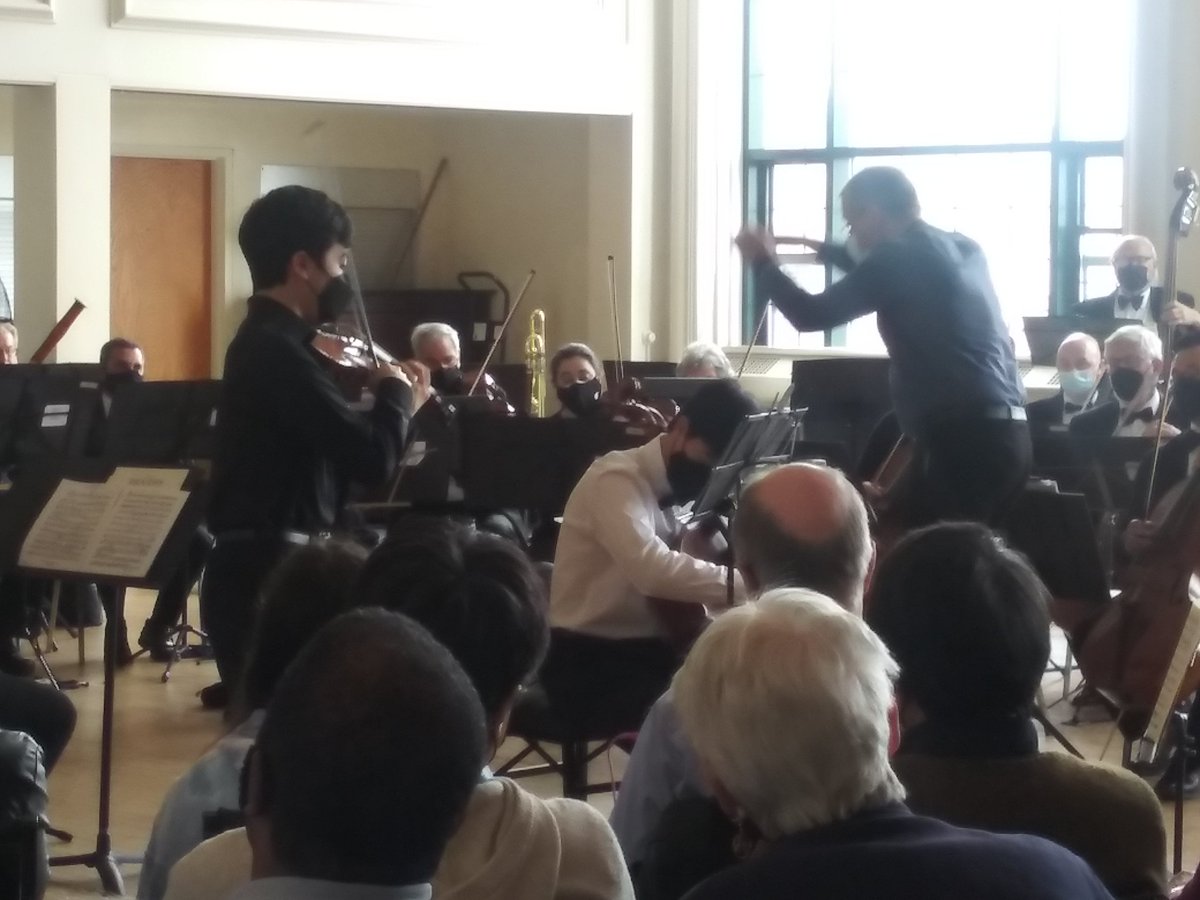 Joe MacDonald, violin, and Hayden Idson, cello, in electrifying performance of Brahms Double Concerto, playing to packed house today!