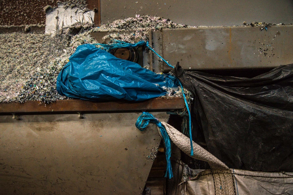 A tiny rope can be a make-shift super update for a machine, as it can tie on a cover or a sack that will save workers from additional work a process may cause. 

Unpublished #archive #photographs from my LDPE (Low-density polyethylene) #project about #plastic waste #recycling
