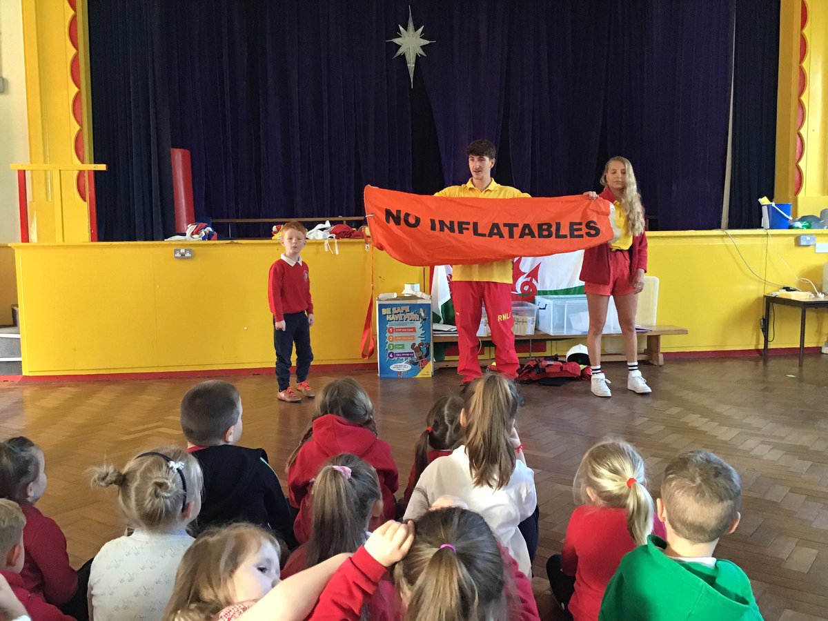 Penclawdd's tweet photo. #pencwhales Reception/Year 1 enjoyed their visit this morning from two local RNLI life guards, Dan and Sophie, who spoke to them about staying safe at the beach. #pencr1 #pencfp #penccomm #rnli @RNLI https://t.co/7Bnl4l5qUg