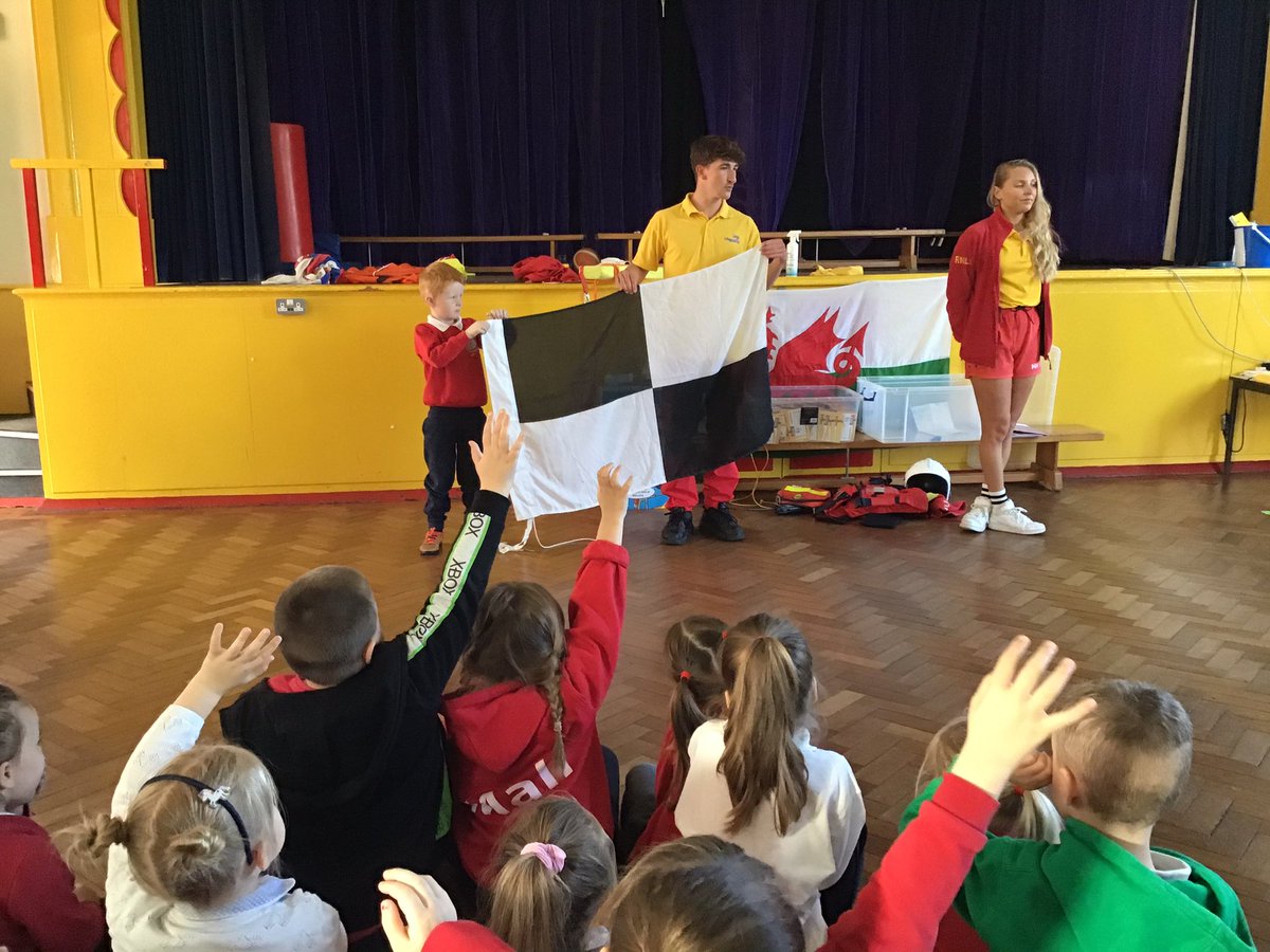 Penclawdd's tweet photo. #pencwhales Reception/Year 1 enjoyed their visit this morning from two local RNLI life guards, Dan and Sophie, who spoke to them about staying safe at the beach. #pencr1 #pencfp #penccomm #rnli @RNLI https://t.co/7Bnl4l5qUg