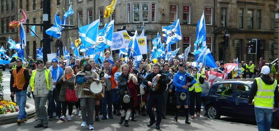 AUOBNOW's tweet image. Seven years ago #OTD the first All Under One Banner - March for Independence was held at Glasgow with c. 300 people participating. Here's the march entering Freedom Sq. to join the Hope over Fear Rally. To date, 27 #AUOB marches have taken place across Scotland. #NoRestTillYes