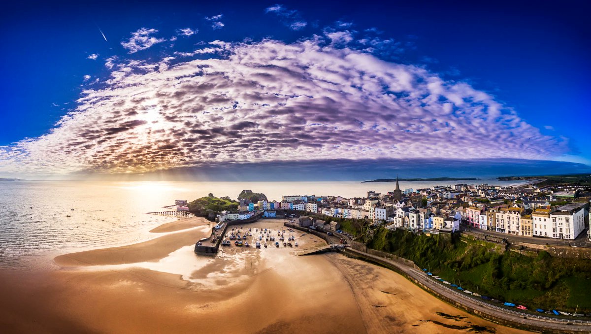 AerialWales's tweet photo. A bird's eye view over the sugared almond coloured houses, quaint harbour and beautiful north beach of #Tenby, West #Wales 🏴󠁧󠁢󠁷󠁬󠁳󠁿

📷🚁 https://t.co/CJkSBVUCrp @visitwales @Pembrokeshire #Drone https://t.co/muYfaMK41I