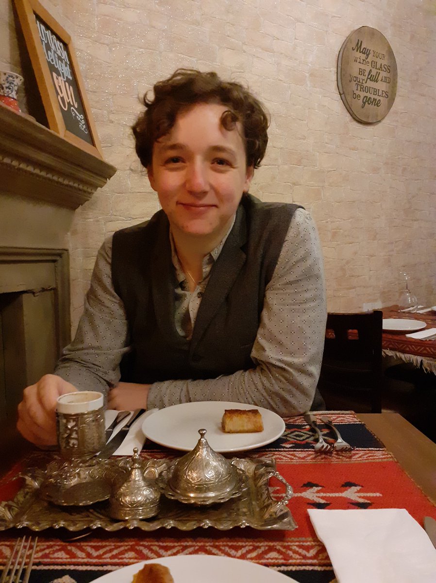 MJH_Warren's tweet photo. Passed my viva with minor corrections in January and completely failed to do any of the requisite social media posts... so here's a photo of me having coffee and baklava after my viva. https://t.co/zxMAMOHMhA