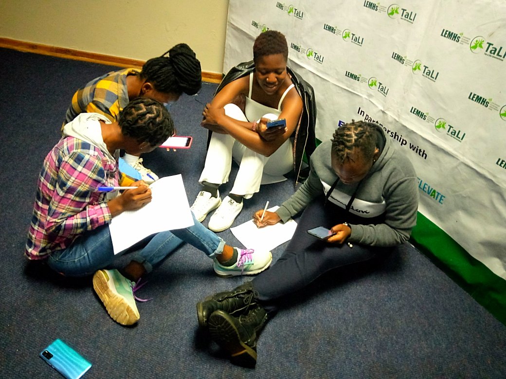 tagalife's tweet photo. Young women and girls doing group work, on why women should participate in governance and democracy, Laws in our constitution that support women participants and also International Laws we which support women participation. @GlobalFundWomen @awdf01 @Nyarimash
#LEMHster
#agyw https://t.co/b7gmWrU8wc