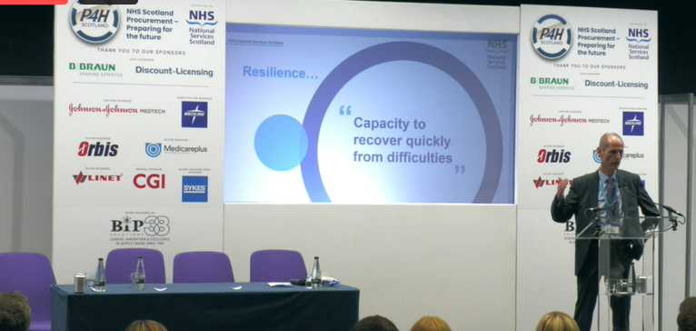 Embedding Resilience – Building on the lessons from #Covid19 in our future #resilience approach: Paul Hornby, Head of Strategic Sourcing &amp; Commercial, <a href="/NHSNSS/">NHS National Services Scotland</a>  - takes the stage at #P4HScotland