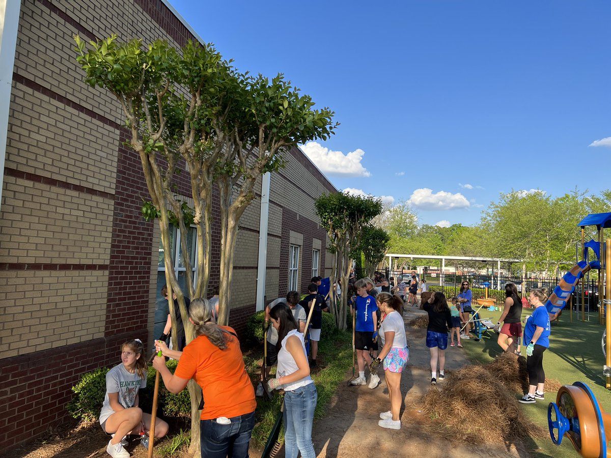 QASchool's tweet photo. In celebration of Earth Day, QA families came together for a Care of Creation project, working in community to beautify our campus. We are grateful to the many who joined us on this beautiful evening to care for our common home. #LaudatoSi #EngageCommunity @CathSchoolsATL https://t.co/tXNmjrvwr8