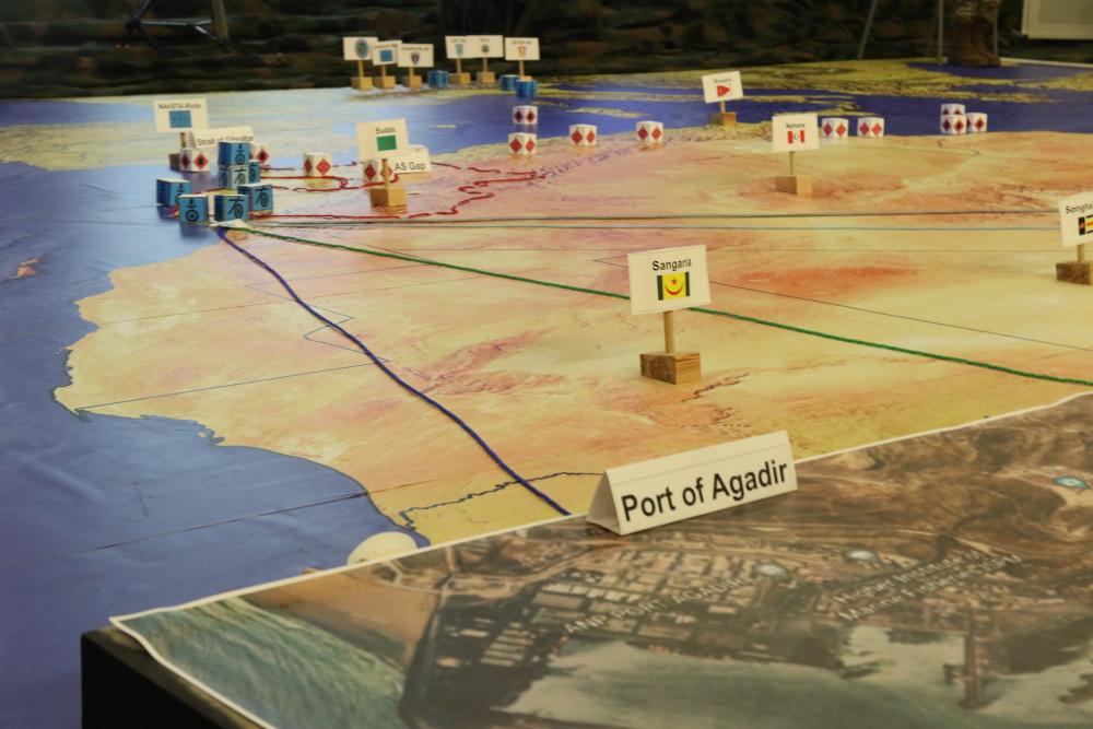 ArmyGeospatial's tweet photo. #BigMaps Rehearse for success! The 79th Sustainment Command (@USArmyReserve) combines imagery with a large map board and 3D markers to plan for 22.2 African Lion Rehearsal of Concept (ROC) drill. https://t.co/epL3aEnxLa