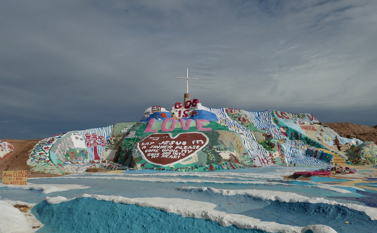 RawVisionMag's tweet photo. Travelling towards #Niland on #StateRoute111, southern California, #SalvationMountain can be seen from a distance. Here in the desert, the monument by #LeonardKnight finds itself in a colourless setting. #RawVision 108.
#outsiderart #artenvironment https://t.co/NEgqfytglw https://t.co/YOrjN7hswi