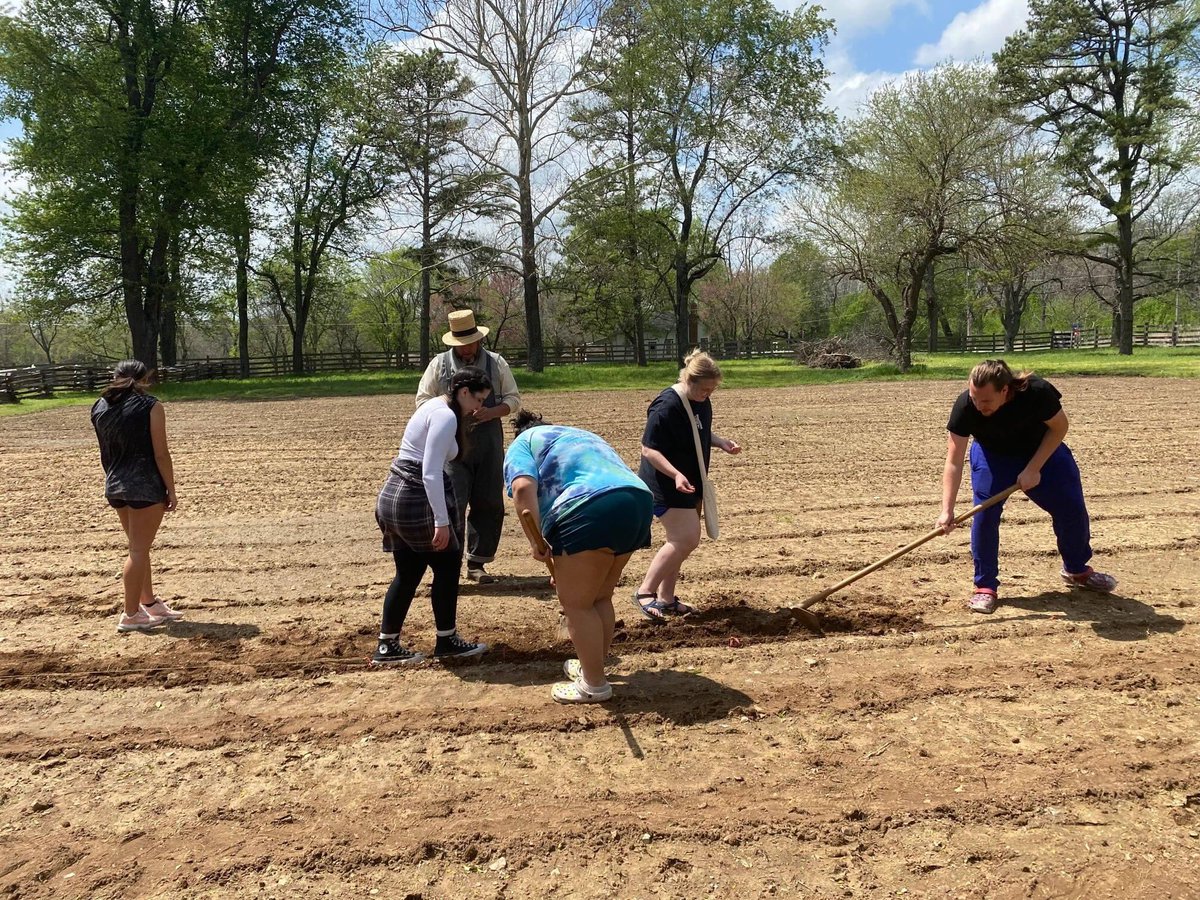 NSUHistory's tweet photo. Students in Dr. Farmer's #NSUOKHistory class had a special visit and experience at the Hunter’s Home today. They made biscuits in the cabin with Sue, helped plant the corn field with Dave, and made brooms with Maddox and Jessika. After their activities, they toured the site. https://t.co/byjJRGd9De