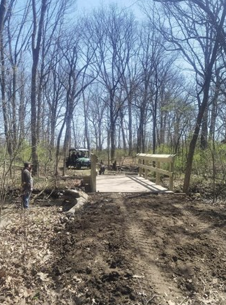 WRMEPICS's tweet photo. EPICS ACRE team's 2nd workday! The team finished building a fence for the bridge, cleared a dirt pile, and drove a gator over to smoothen the tracks. https://t.co/zzSQbA6Jod
