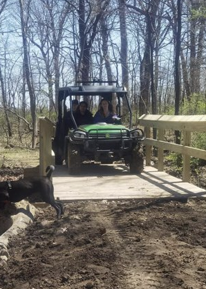 WRMEPICS's tweet photo. EPICS ACRE team's 2nd workday! The team finished building a fence for the bridge, cleared a dirt pile, and drove a gator over to smoothen the tracks. https://t.co/zzSQbA6Jod