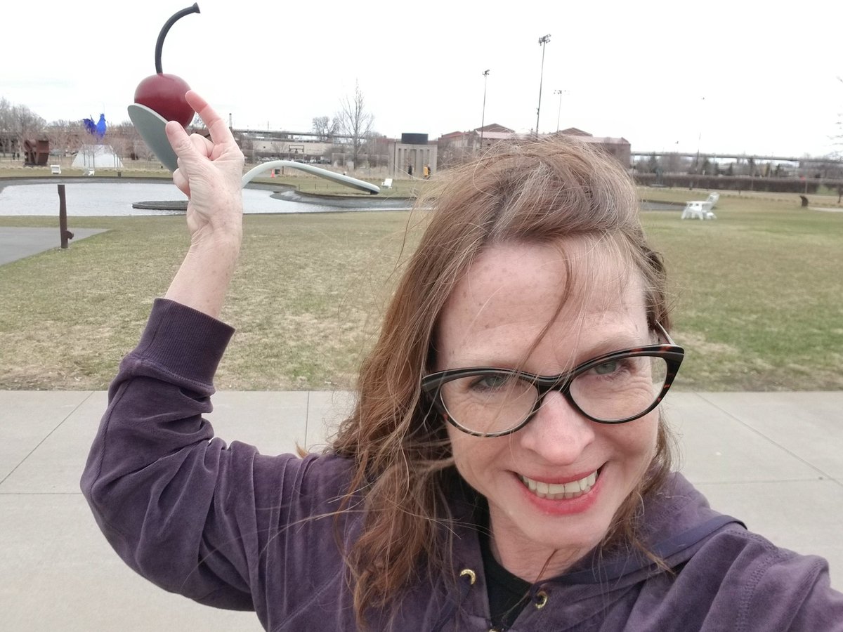 AnnT's tweet photo. Terrible picture but nailed a windy selfie crushing the head of Claes Oldenburg's cherry from #SpoonandCherry #arteveryday https://t.co/cbDvsYTZtE