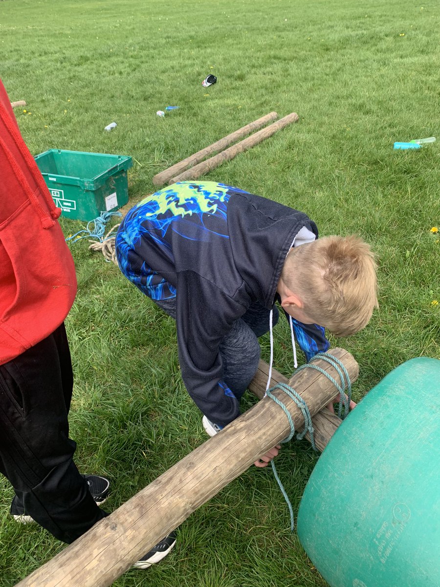 Team 1 attaching their wheels