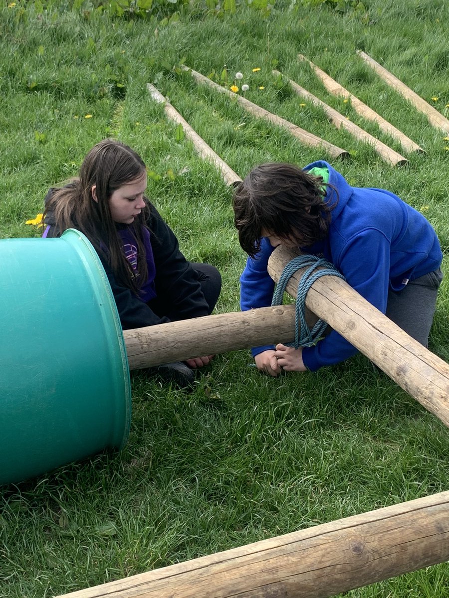 Team 2 attaching their wheels