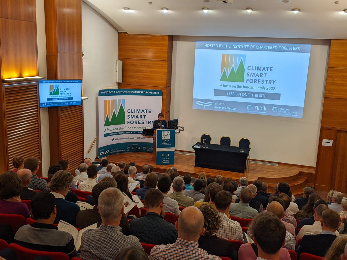 TheICF's tweet image. Session One of #ClimateSmartForestry, The Site, is underway, chaired by Dr @hmallison2, Forestry Commissioner. The first presentation, 'Designing Resilient #Woodlands in Practice' is currently being delivered by Dr Eleanor Tew of @ForestryEngland.